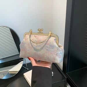 Elegante borsa jacquard retrò con manico ad anello dorato e chiusura vintage