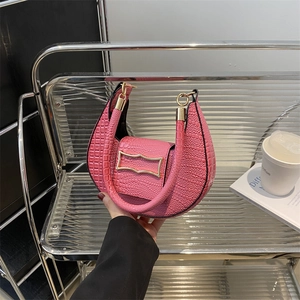 Pink crescent shoulder bag with crocodile pattern and geometric gold buckle for women