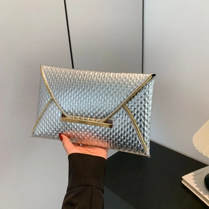 Silver envelope clutch bag with metallic scale texture and gold metal accents for women