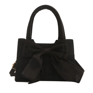 Elegant black bow handbag with matte texture and gold hardware for women