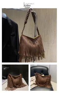 Detail of coffee brown tassel shoulder bag featuring woven strap and leather fringe textures