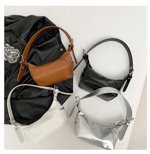 Collection of leather Hobo bags in brown, black, white, and silver with adjustable straps
