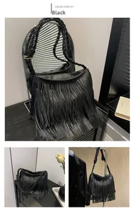 Detail of black faux leather tote with long fringes and braided shoulder strap