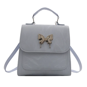 Minimalist light blue PU leather backpack with silver butterfly buckle and pleated texture