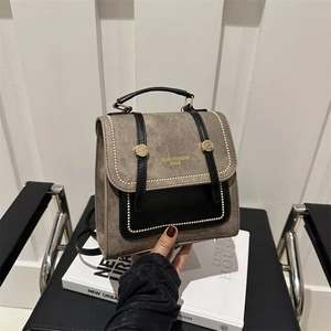 Retro taupe suede dual-use backpack with black leather trim and golden hardware accents