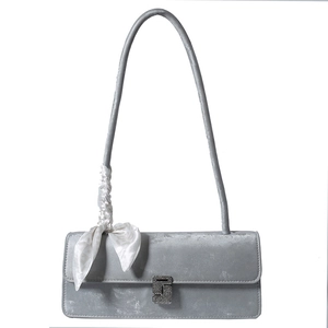 Silver-grey velvet rectangular shoulder bag with square metal buckle and printed silk scarf