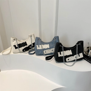 Three half-moon crossbody bags in white, denim blue, and black with IJNN CIRCLE lettering