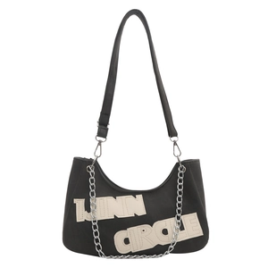 Fashionable black half-moon crossbody bag with silver chain and LINN CIRCLE patch