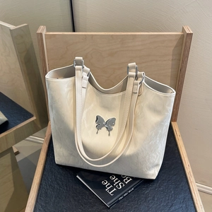 Chic cream velvet tote bag with butterfly metal ornament for daily commute and students