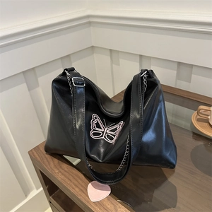 Elegant black PU shoulder bag with pink butterfly embroidery and metal chain strap