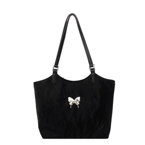 Black velvet tote bag with silver butterfly buckle, minimalist shoulder bag for women