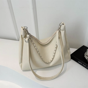 Minimalist cream-colored chain underarm bag with lychee texture and silver hardware