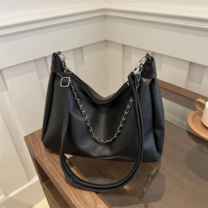 Fashionable black large capacity tote bag with silver chain and textured faux leather finish