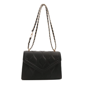 Chic black wave quilted shoulder bag with gold chain strap in minimalist square design