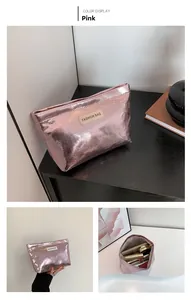 Pink metallic makeup bag with geometric texture, Fashion Bag label, and spacious interior