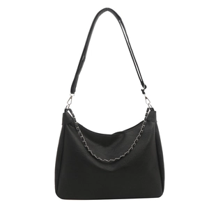 Minimalist black crescent shoulder bag with silver chain and adjustable strap