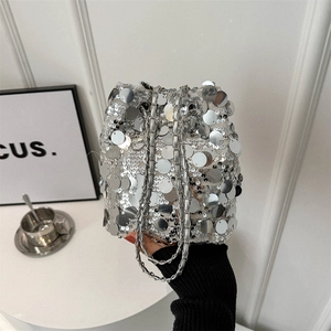Chic silver sequin bucket bag with metal chain strap for party and fashion casual use