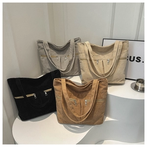 Corduroy tote bags in multiple colors with dual front zippers and shoulder straps