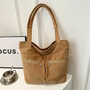Brown corduroy large capacity tote bag with front zipper pockets for daily commute