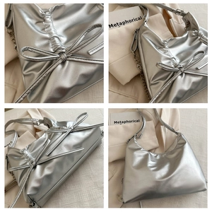Detailed views of a silver pleated hobo bag featuring bow accents and metallic finish