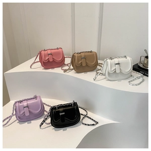 Minimalist saddle bags in pink, khaki, white, purple, and black with chain straps