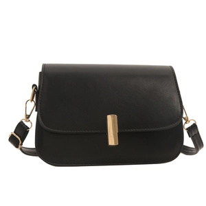 Minimalist black PU leather crossbody bag with elegant gold hardware on white background