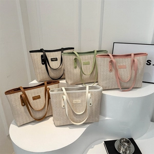 Trend straw woven tote bags in five colors with leather handles and fashion logo