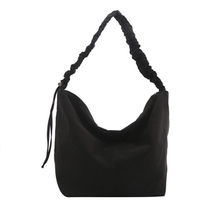 Large black nylon hobo bag with cloud pleated strap and minimalist unisex design