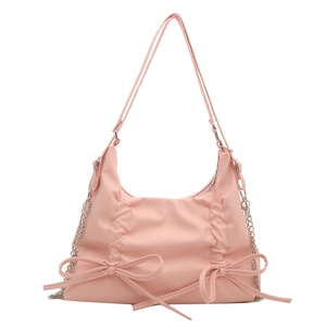 Pink underarm bag with decorative bows, soft pleats, and silver chain shoulder strap