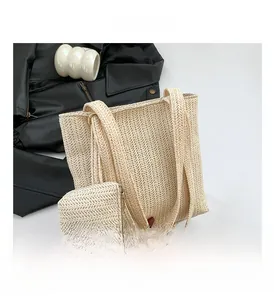 Detailed close-up of woven tote bag set with herringbone pattern and matching pouch
