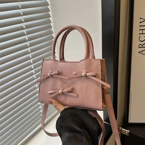 Borsa a mano rosa con fiocchi e perle, elegante borsa a tracolla in pelle opaca da donna