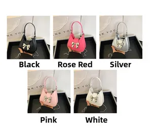 Mini handbags in five colors featuring large metal bows and stylish chain straps