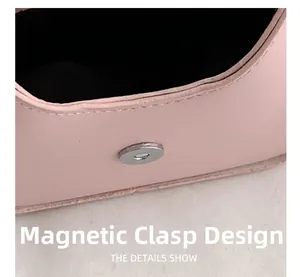 Detailed close-up of pink leather mini bag featuring secure magnetic clasp closure
