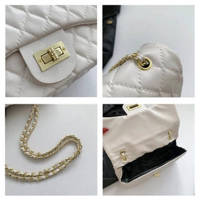 Detail view of beige quilted bag showing golden clasp chain strap and inner lining