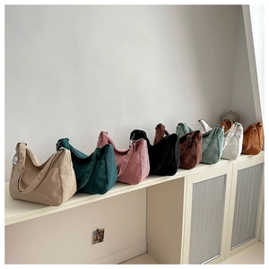 Corduroy shoulder bag color collection with soft texture and side pockets