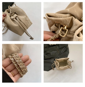 Detail shots of beige marble pattern bucket bag with gold chain and drawstring closure