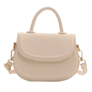 Elegant cream beige saddle handbag with golden hardware and adjustable strap