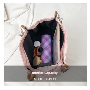 Pink leather tote bag with spacious interior for tablets and daily essentials