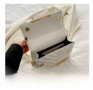 Internal view of white lychee texture square bag showing storage capacity for a smartphone