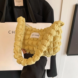Fashionable yellow bubble textured shoulder bag with LOVE FASHION label for women