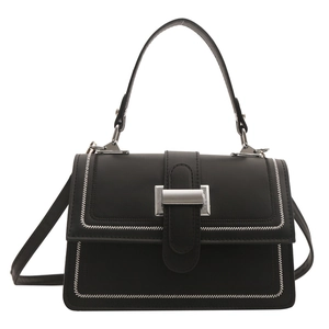 Chic black handbag with white contrast stitching and silver metal lock on a clean white background