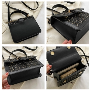 Detailansicht der Hahnentritt-Tweed-Handtasche mit Innenraum und Magnetverschluss