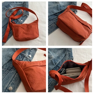 Detailed views of orange nylon crossbody bag showing interior space and adjustable strap