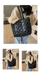 Détail du sac cabas matelassé noir en nylon brillant avec texture à motif de losanges