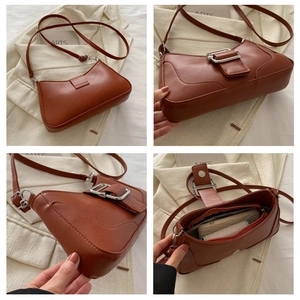 Vue détaillée du sac baguette vintage marron avec boucle argentée et poche intérieure