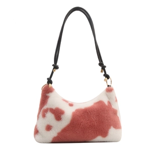 Stylish plush faux fur shoulder bag with pink cow print and black leather strap