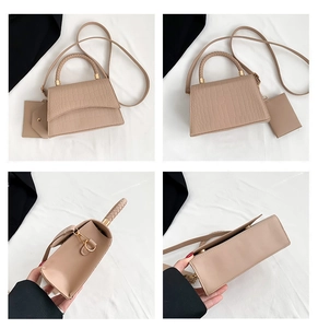 Detail view of beige crocodile embossed tote bag with woven handle and small pouch