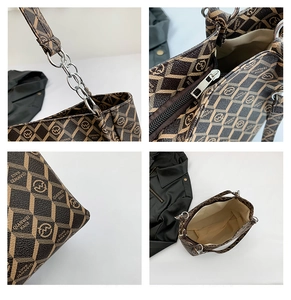 Detail shots of brown monogram tote bag with chain strap and spacious interior