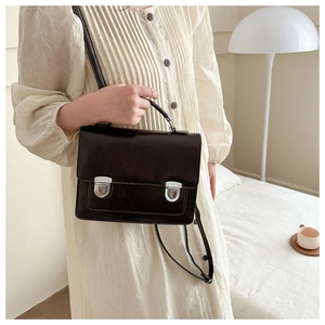 British style vintage dark brown leather bag with silver buckles and adjustable strap