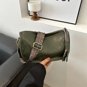 Vintage dark green Boston bag with colorful bohemian embroidered strap and gold hardware